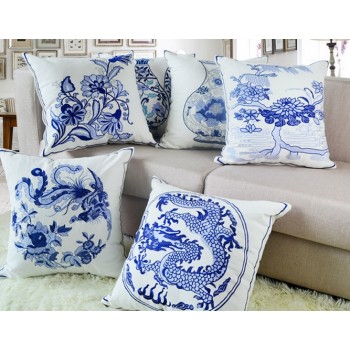 Blue and white embroidered pillow